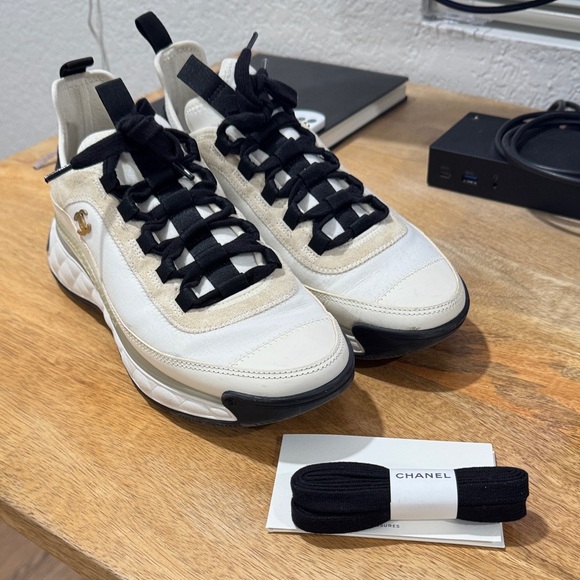 CHANEL Shoes - CHANEL White and Black Lace-Up Sneakers